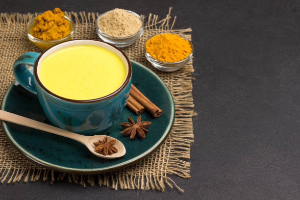 istock Herbal therapy concept.  Golden latte with ingredients for cooking 1199390599