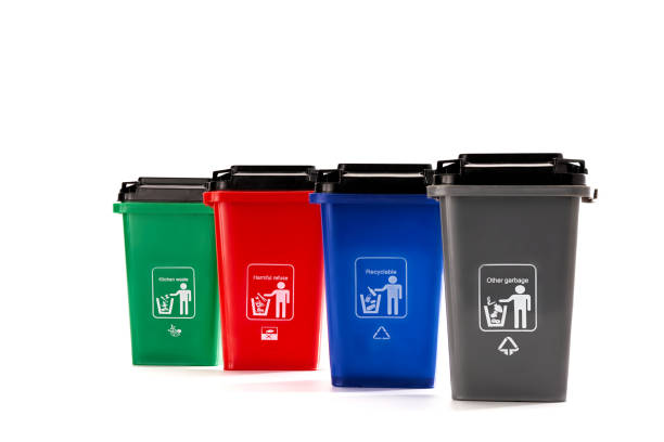 istock Four color environmental trash cans, garbage recycling concept 1199390931