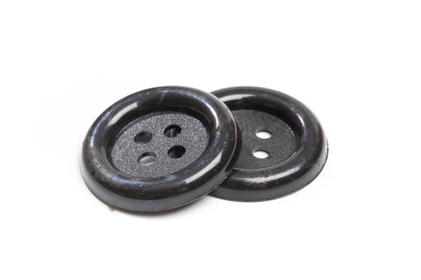 istock Buttons for clothes on white background using for concept of Button Day. 1199391796