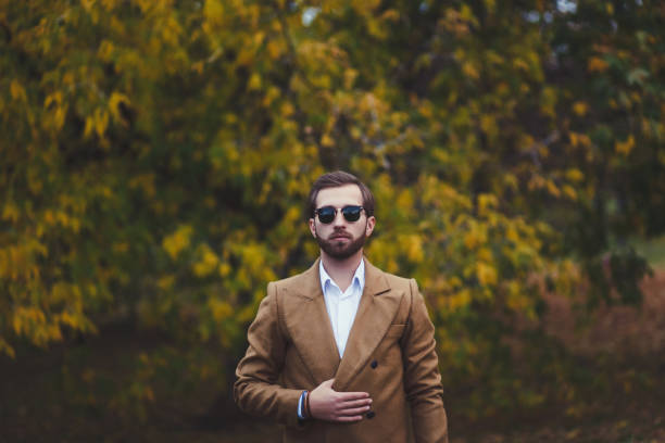 istock stylish man in elegant coat 1199394280