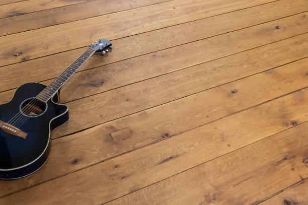 istock guitar on wooden floor background image 1199394705