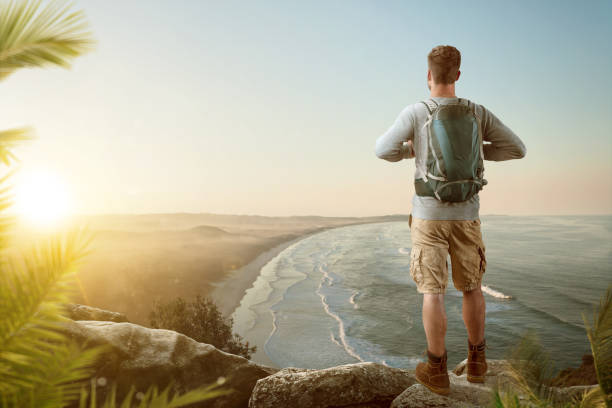 istock Hiker with a scenic view over a coastline 1199396097