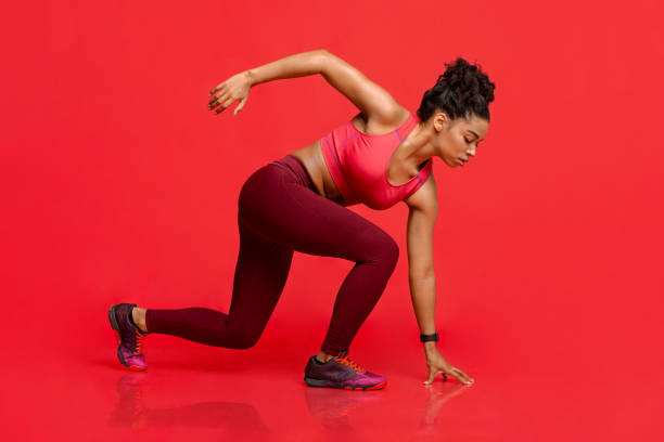Athletic woman in steady pose, running concept