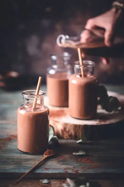 Photo of Chocolate Smoothie, Banana and Peanut Butter. Vegan drink