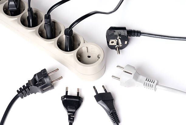 Power supply plugs and one free outlet isolated stock photo