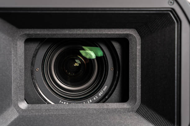 istock Professional 4K video camera lens, extreme close-up 1199402325