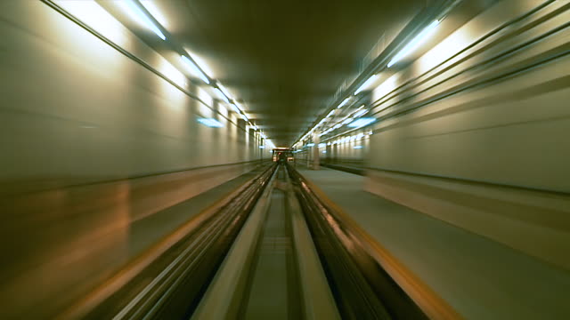 Automatic Train Moves in a Tunnel Fast Speed Modern City Time Lapse