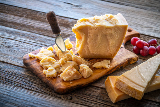 istock Parmesan Reggiano cheese on cutting board 1199406182