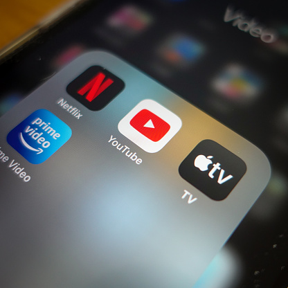 Italy, Rome - January 14 2020: The icon of the streaming app YouTube, surrounded by other competitors app the screen of an iPhone. The main competitor for YouTube are today Amazon Prime, Apple TV and Netflix.