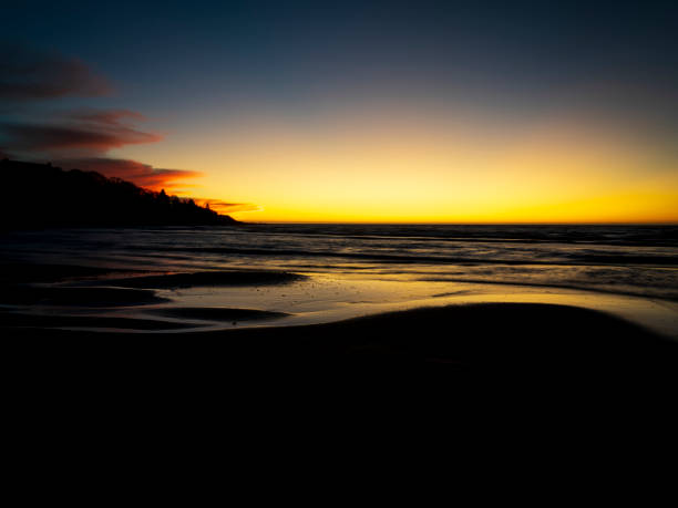 istock Sunset over curved sand bar in Buzzards Bay on Cape cod 1199408609