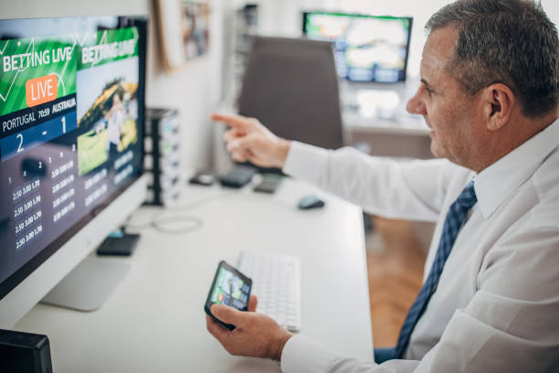 istock An older businessman bets online from the office 1199415075