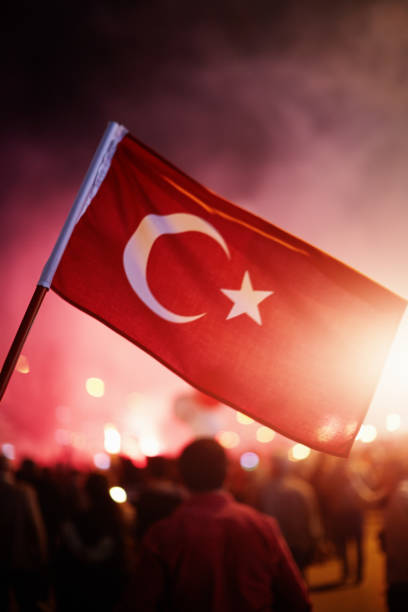 istock Crowded people celebrating or protest with Turkish flags in hand 1199416026