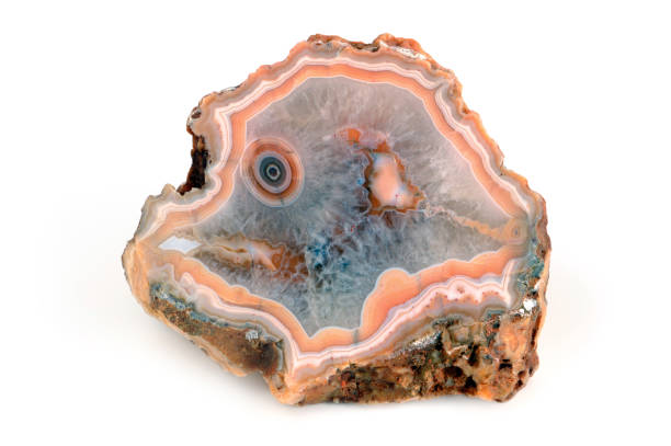 istock banded agate in orange and blue color on isolated background. gem stone. 1199416502