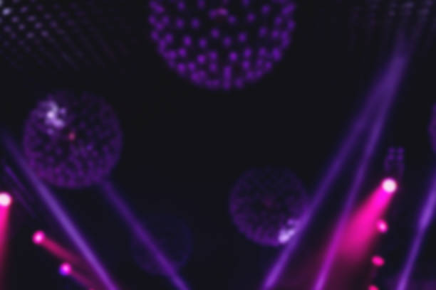 istock Blur background with bokeh light at a music concert Defocused background 1199417644