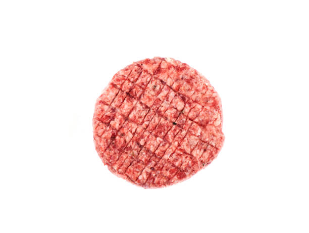Raw pink beef cutlet isolated on a white background.