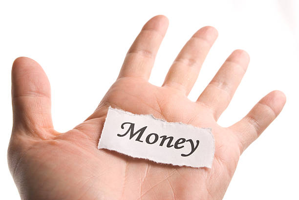 istock Money word in hand 119942050