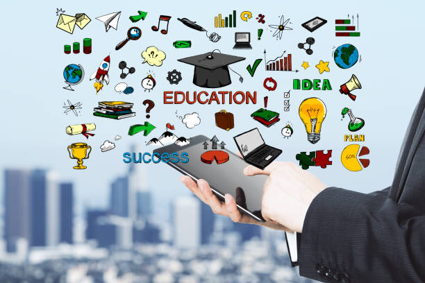 istock Educational concept with hand drawn symbols and words and businessman working using digital tablet. 1199420897