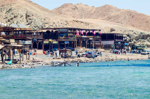 A small tourist village located on the banks of the blue hole in Dahab Dahab, Egypt May 11, 2019: A small tourist village located on the banks of the blue hole in Dahab. dahab photos stock pictures, royalty-free photos & images