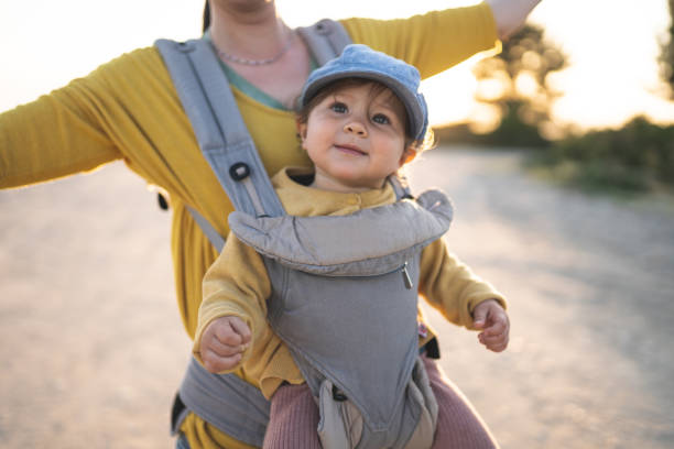 istock Mother walking on the beach with her daughter 1199424297