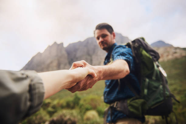 istock The climb is easier when we help each other 1199427309