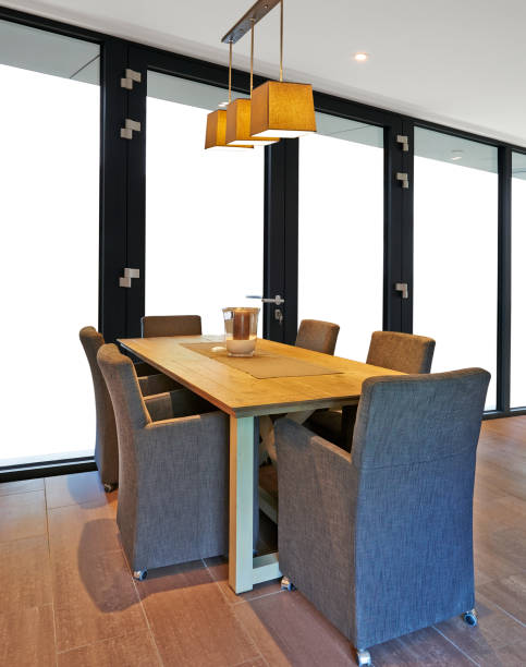 istock Elegant and luxury dining table with great windows 1199427719