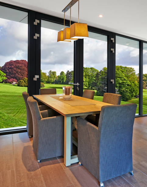 istock Elegant and luxury dining table with great windows 1199427964