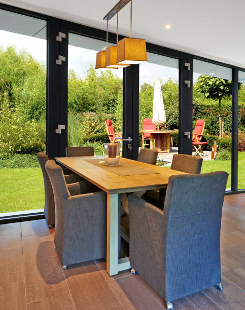 istock Elegant and luxury dining table with great windows 1199427991