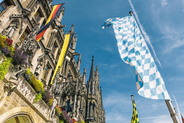 flags waving in the wind of Munich town hall