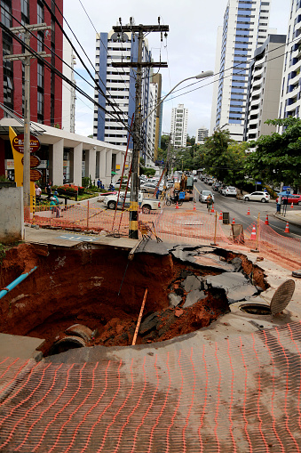 salvador, bahia / brazil - april 4, 2015: Crater opens in sewerage due to rain on Leonor Calmon Street in Salvador.