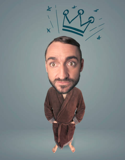 istock Big head person with crown 1199432215