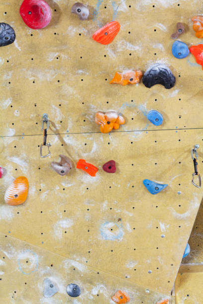 istock Grips of free climbing indoor wall 1199432394