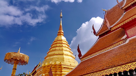 Temple and Pagoda in Thai  style against blue sky