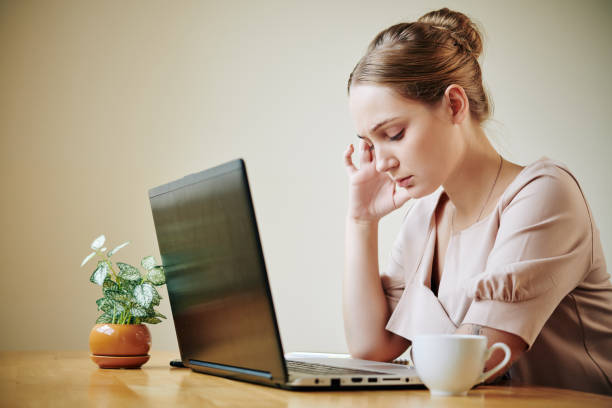 istock Young Woman Sufferring Headache 1199448101