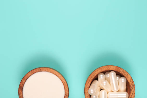 istock Collagen in capsules and in powder 1199449146