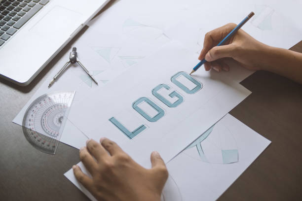 istock Graphic designer creative design sketch drawing logo Trademark brand Workspace 1199449388