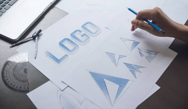 istock Graphic designer creative design sketch drawing logo Trademark brand Workspace 1199449397