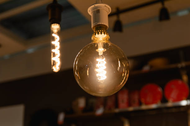 istock Warm atmospheric light. Concept indoor photo with lamp 1199449810