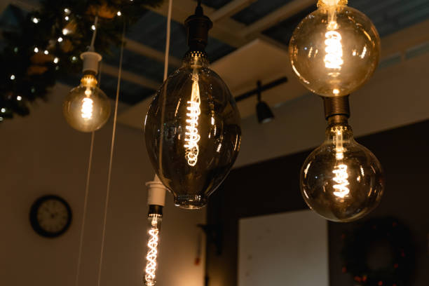 istock Warm atmospheric light. Concept indoor photo with lamp 1199449815