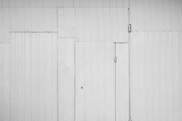 istock Old metal box with a door , white metal sheets with rivets, background or texture. 1199451559