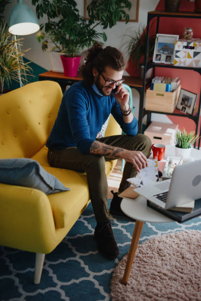 istock Millennial man talking on the phone 1199453989
