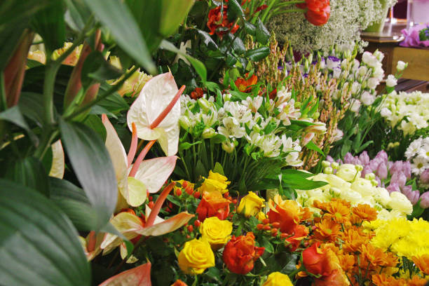 istock Cut flowers in dim shop 1199454155