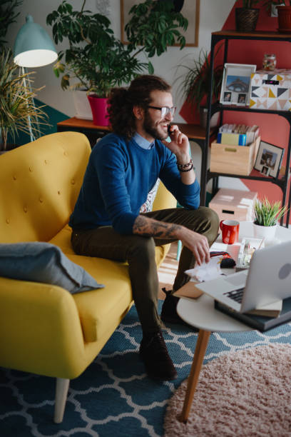istock Millennial man talking on the phone 1199454191