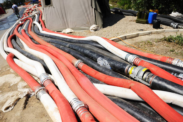 water pumps and large hoses for pumping water out of the flooded area stock photo