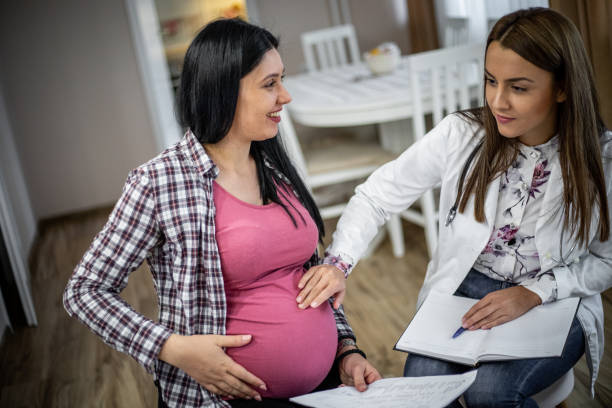 istock Pregnant woman home examination 1199456236