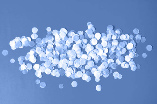 istock Beautiful background with round confetti in classic blue. 1199457282