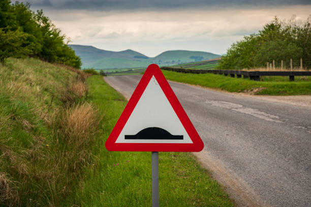Street sign - uneven road, on the way to Grimwith Reservoir, North Yorkshire, England, UK