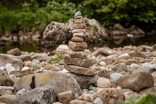 Cairn on the shore of the River Wharfe in Hubberholme, North Yorkshire, England, UK