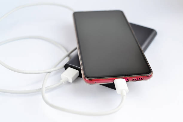 istock Smartphone is charging from the power bank 1199457883