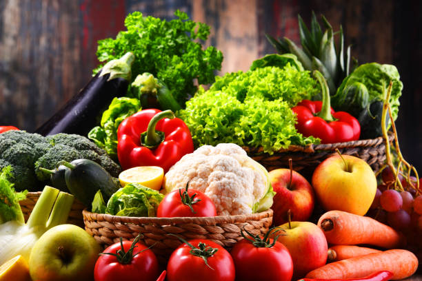 istock Composition with assorted organic vegetables and fruits 1199458079