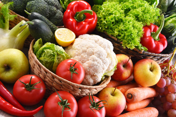 istock Composition with assorted organic vegetables and fruits 1199458177